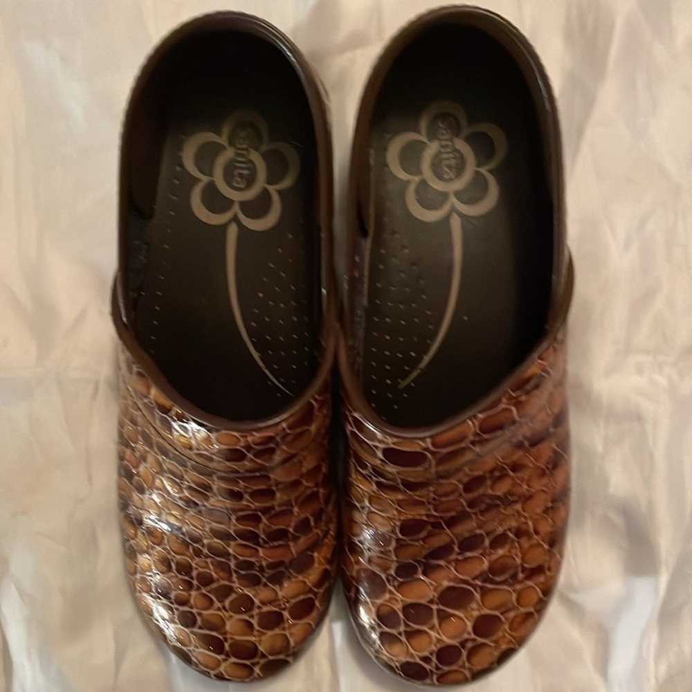 Sanita brown snakeskin print clogs​​